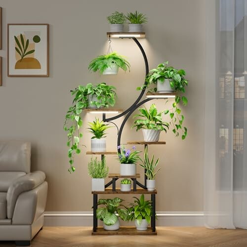 Stylish indoor plant stand with various green plants and modern lighting.